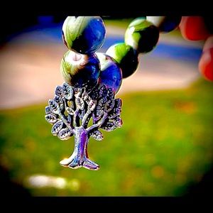 Green charm bracelet with tree charm🌻🌲